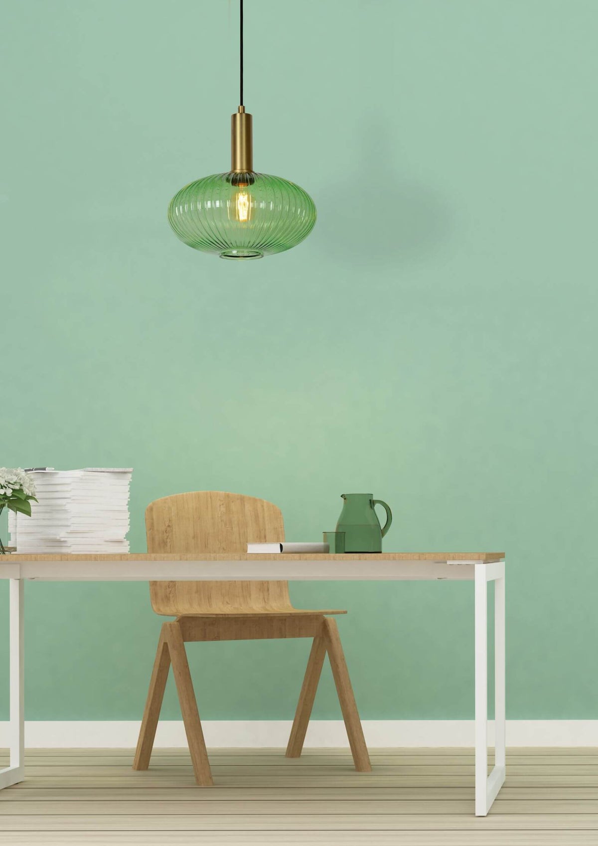 Mise en ambiance rapprochée du luminaire allumé au-dessus du plan de travail