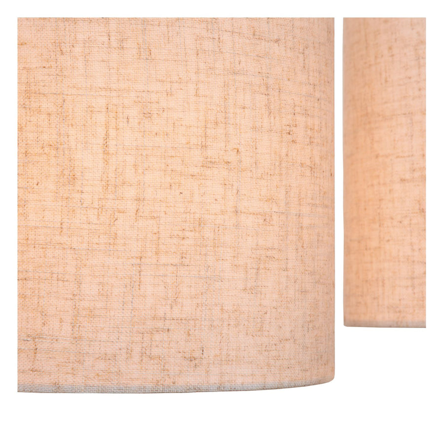 Gros plan sur la texture en coton beige de l'abat-jour.