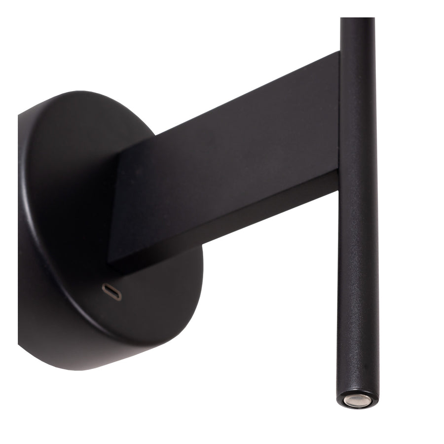Détail rapproché de la platine de fixation et du tube métallique noir