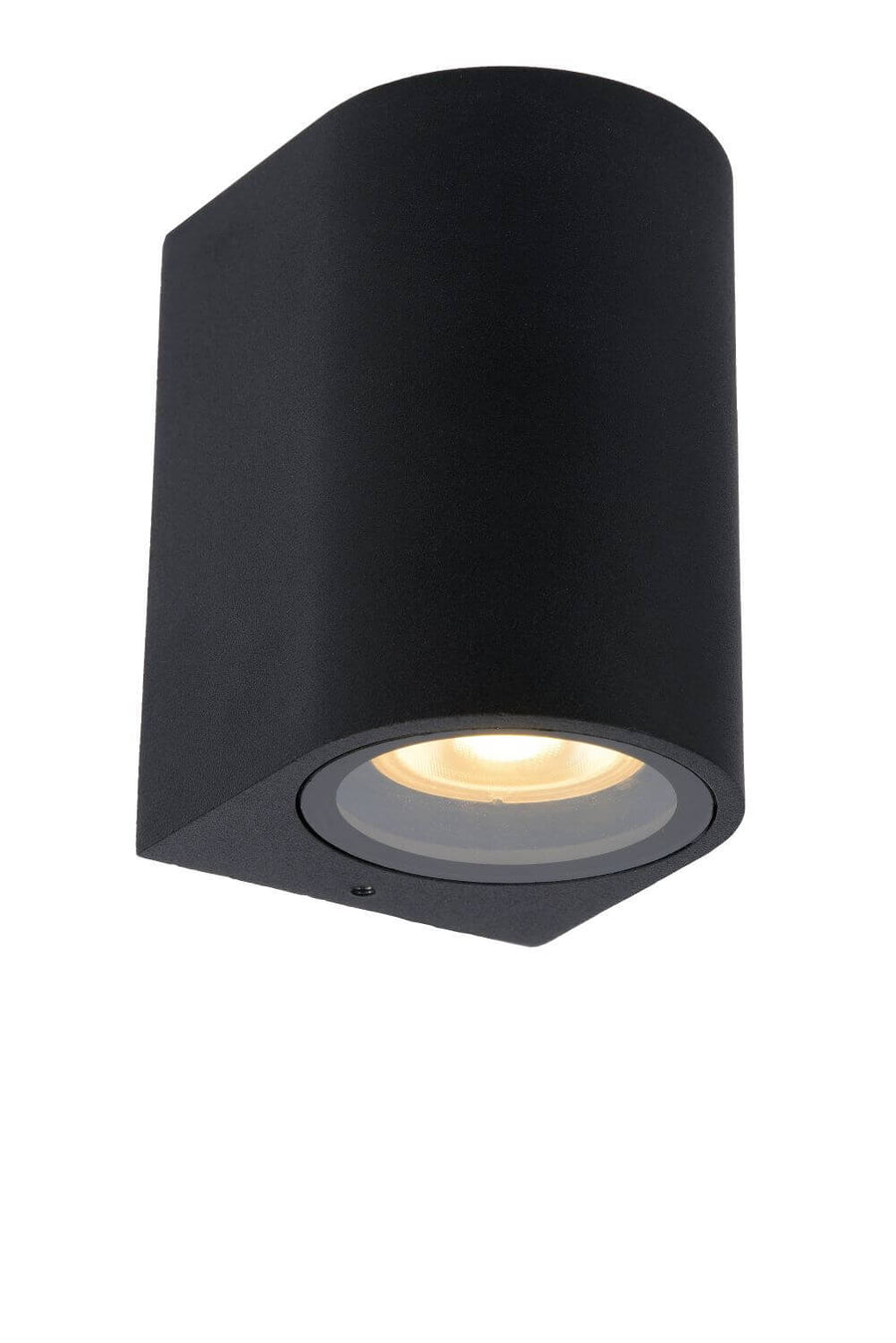 Gros plan du boîtier noir texturé, sortie de lumière ronde sous la face inclinée