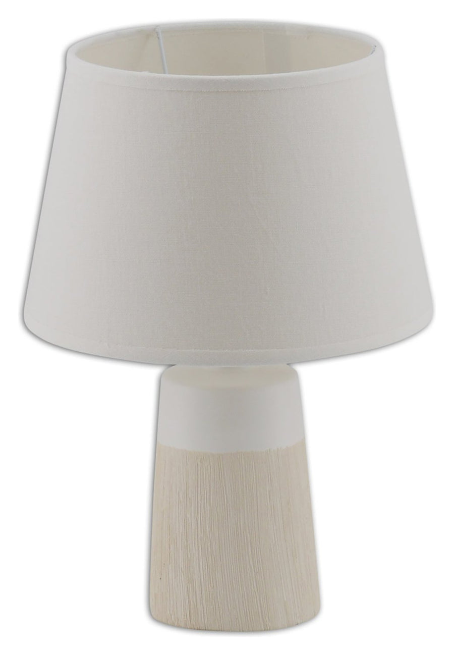 Vue rapprochée de la lampe blanche, montrant l'abat-jour en tissu et le pied cylindrique.