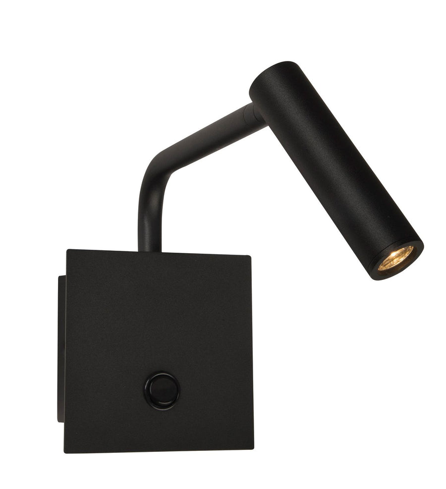 Vue de face sur fond blanc du luminaire noir, bras relevé et tête cylindrique