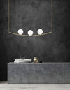 Suspension Vitton 3 lumières dorée, verre