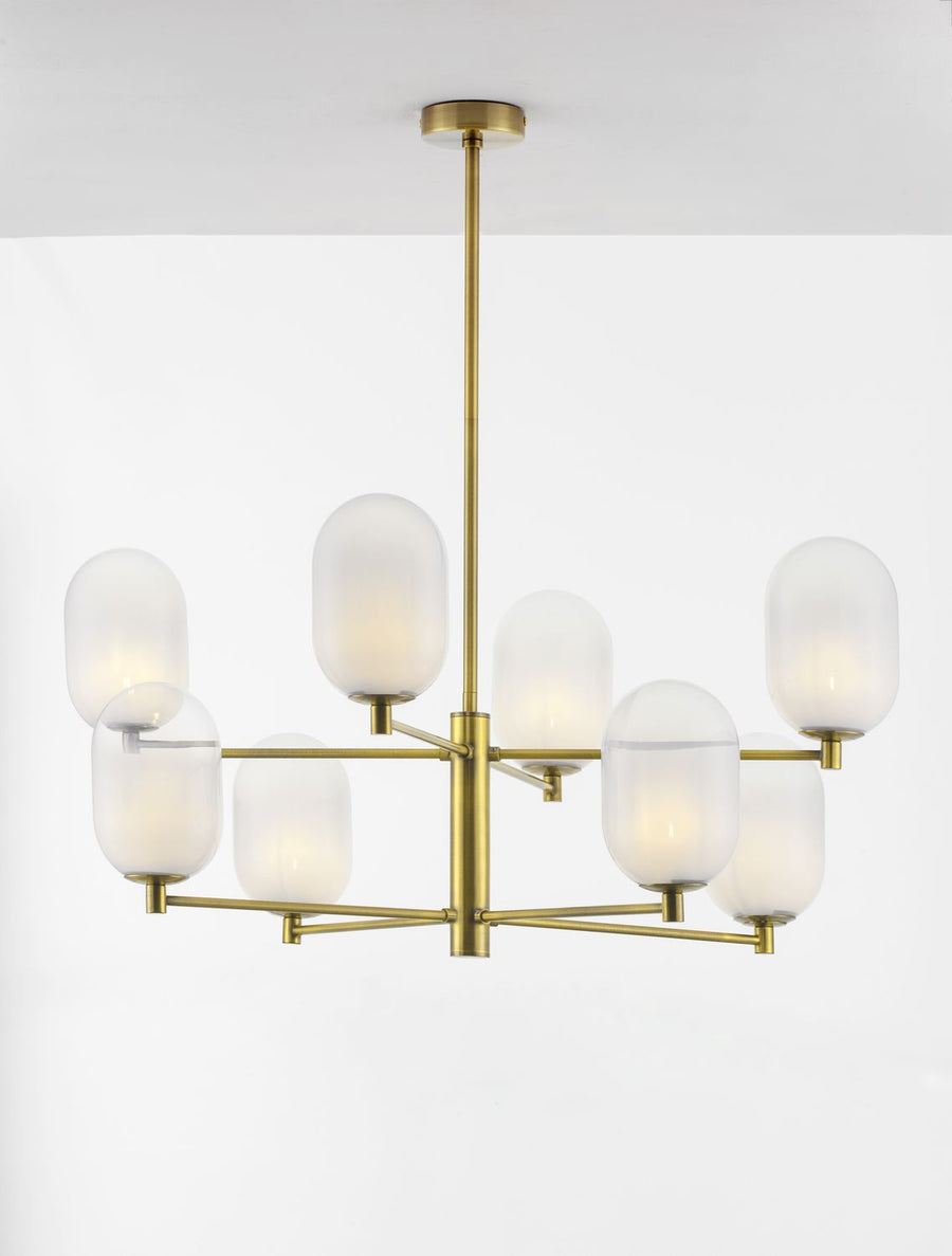 Luminaire allumé de face, verres opalins diffusant une lumière chaude