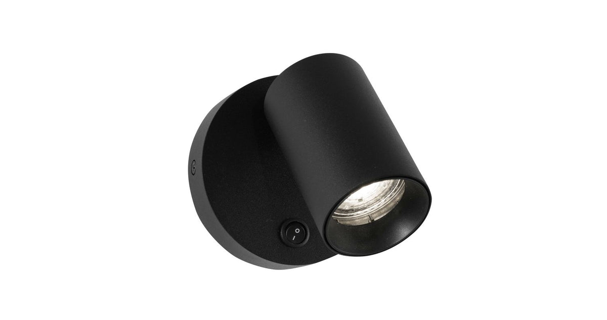 Vue détachée sur fond blanc du projecteur cylindrique noir et de sa base ronde