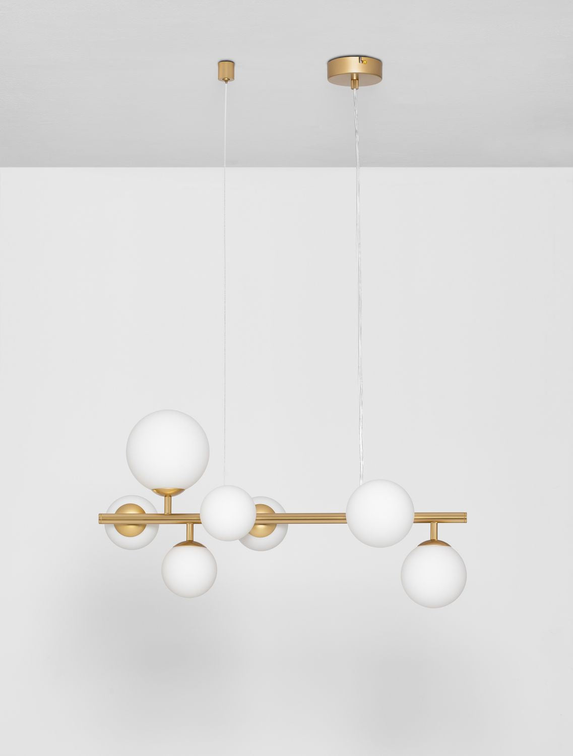 Suspension Odillia 7 lumières dorée, verre
