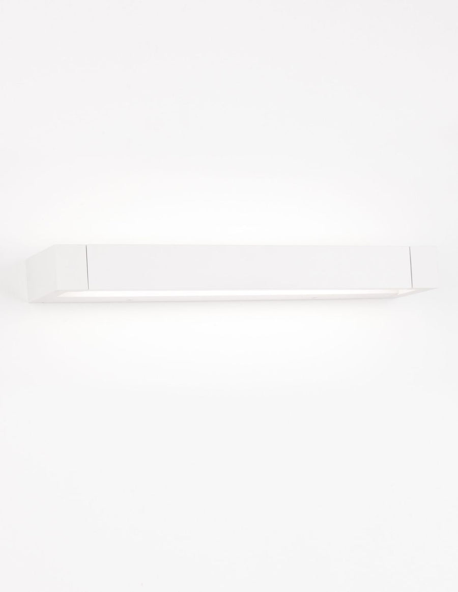 Vue frontale du caisson blanc allumé diffusant une lumière douce vers le bas