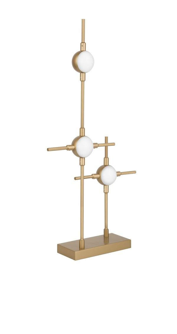 Vue de face sur fond blanc, structure dorée à trois globes opalins