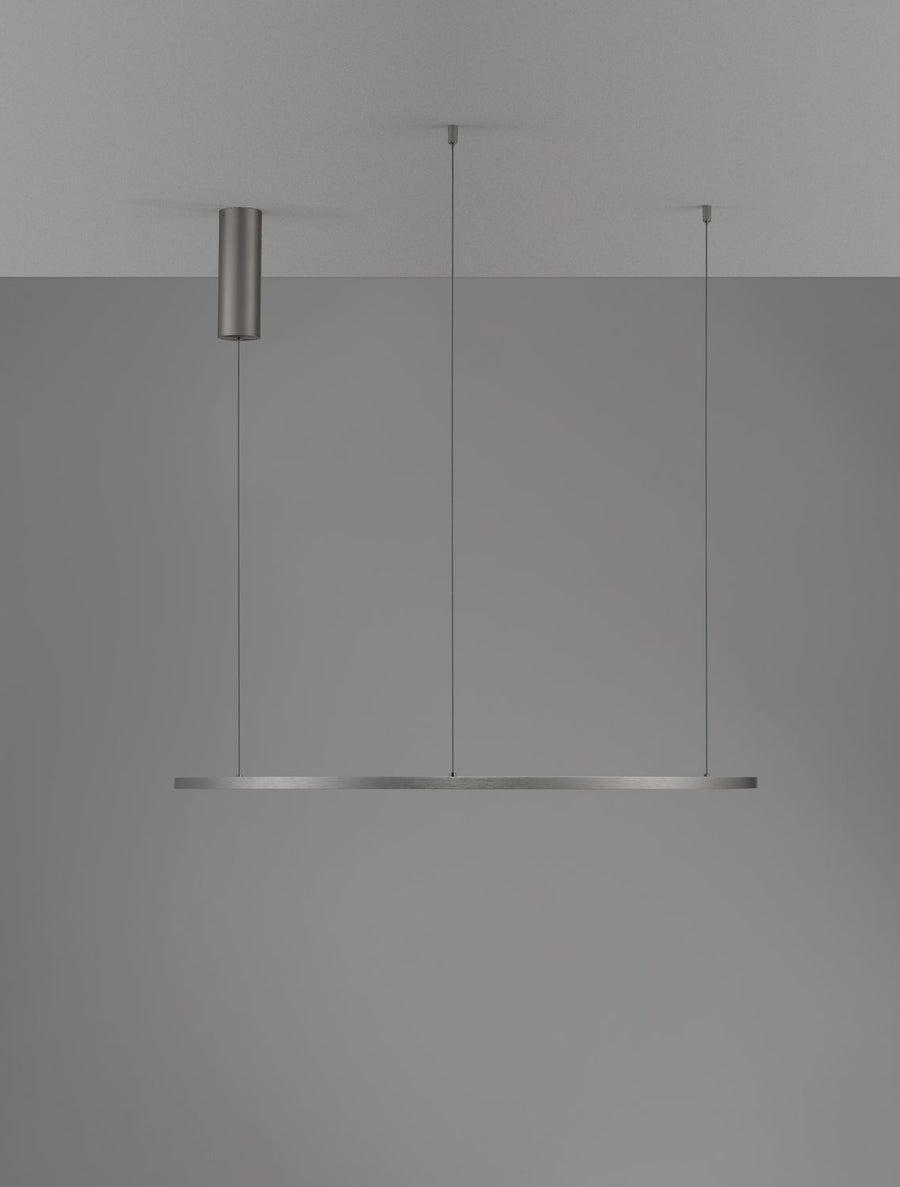 Silhouette de profil du luminaire suspendu sur fond gris uni