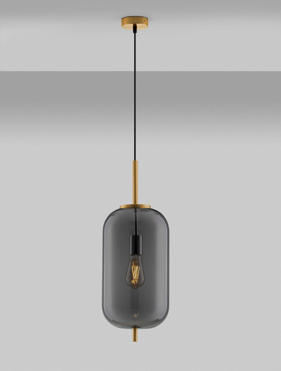 Suspension allumée, ampoule à filament dorée visible à travers le verre fumé