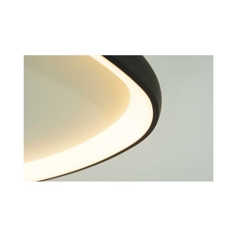 Gros plan sur le bord noir et le diffuseur lumineux allumé