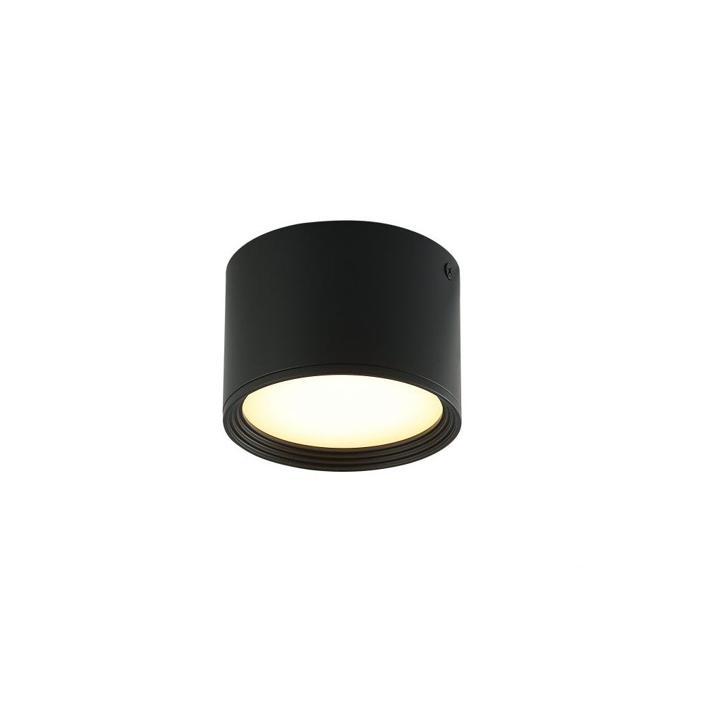 Même plafonnier allumé, halo lumineux chaud diffusé par le bas du cylindre