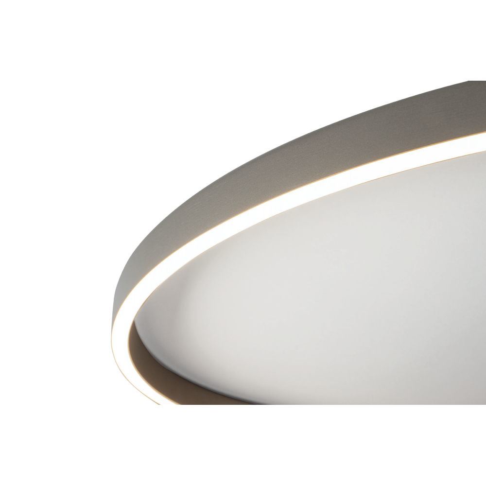 Gros plan sur le bord du luminaire, détail du liseré LED et de la finition