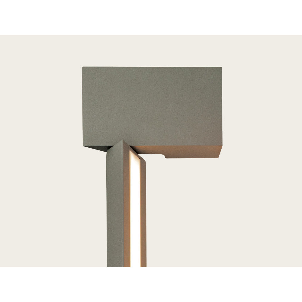Détail du pivot supérieur et de la finition graphite avec diffuseur lumineux allumé.