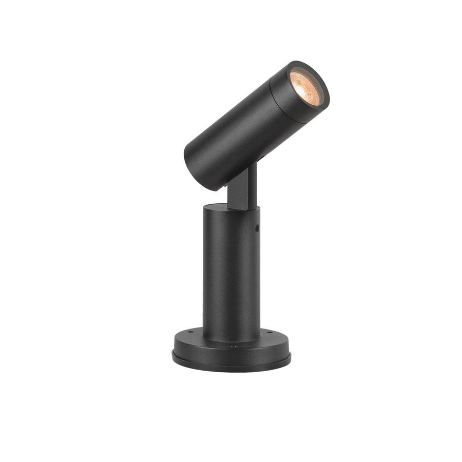 Autre angle du luminaire noir, tête inclinée montrant la base ronde.