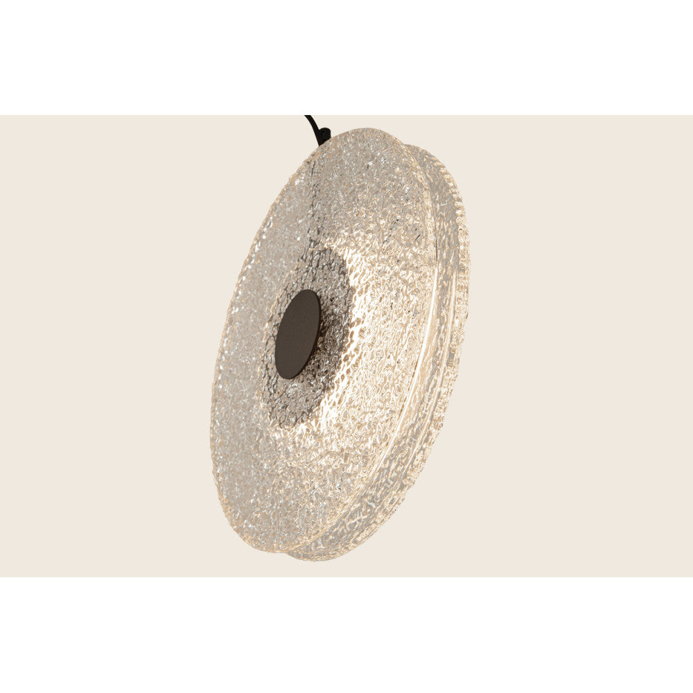 Profil du luminaire sur fond beige, épaisseur du disque en verre