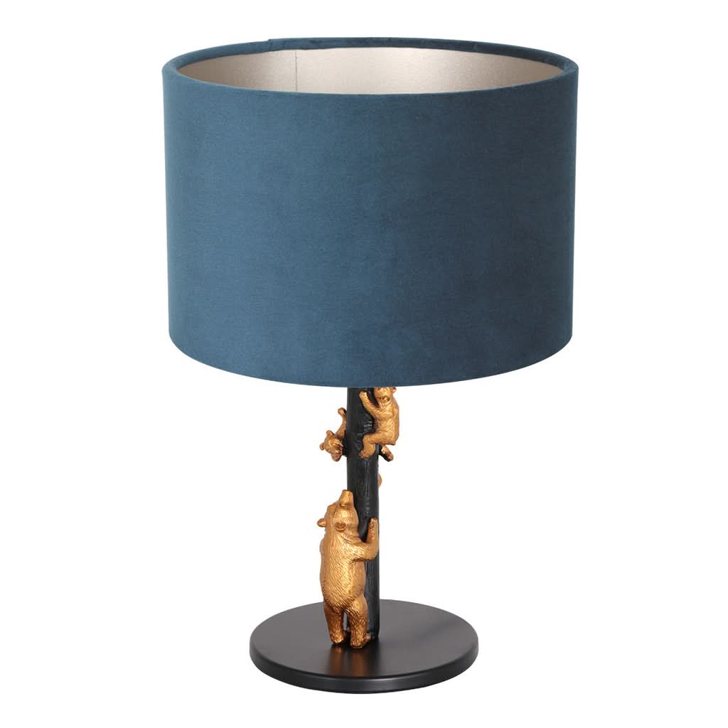 Vue de face de la lampe avec abat-jour en velours bleu et petits ours dorés.