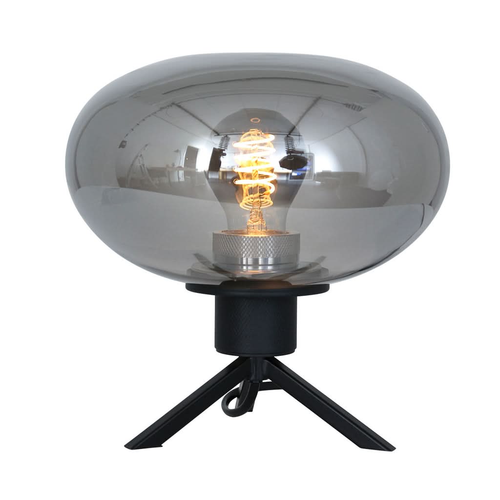 Lampe de table présentée de face sur fond blanc, câble d'alimentation visible
