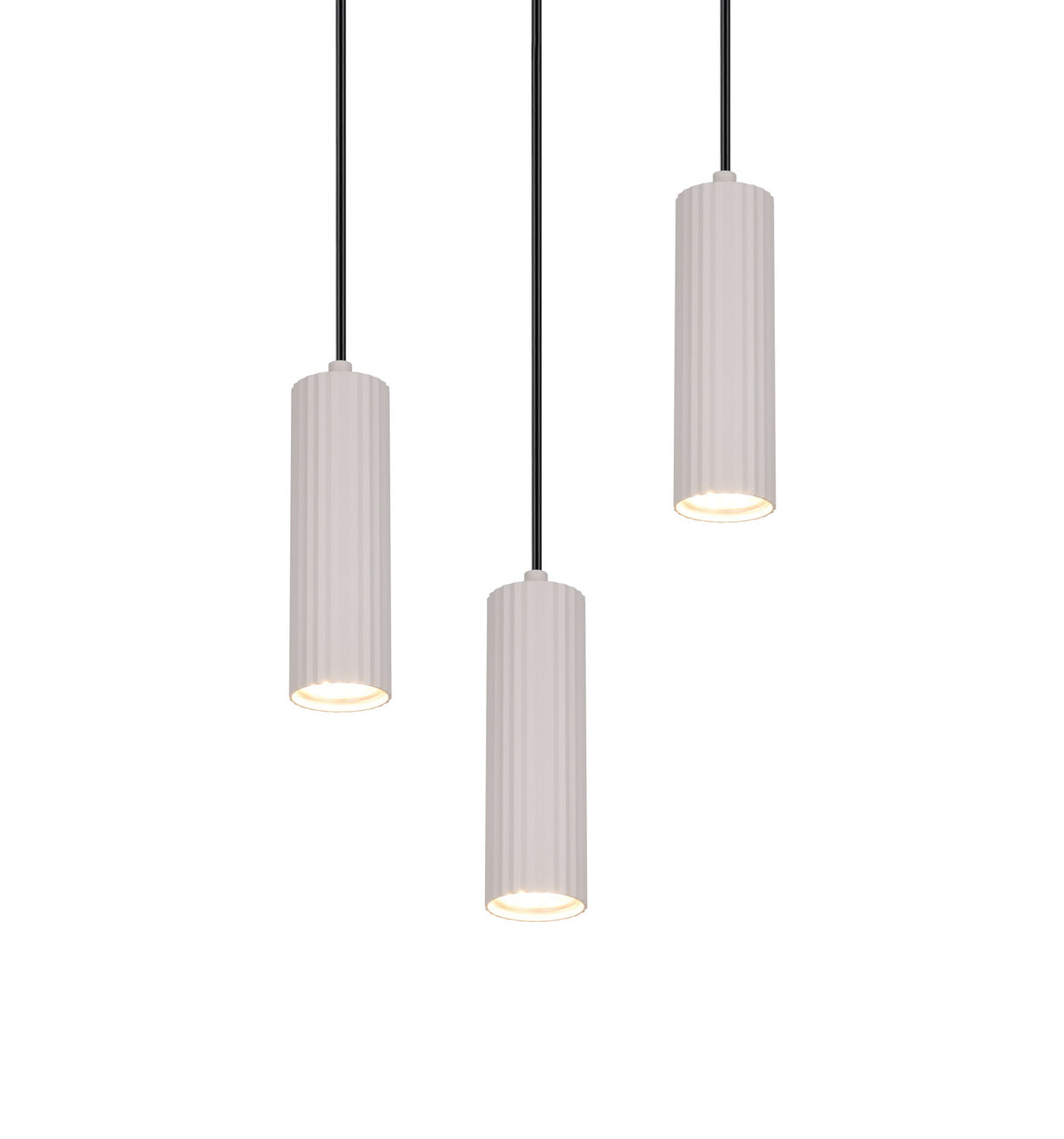Gros plan sur les trois diffuseurs allumés et leur lumière chaude.