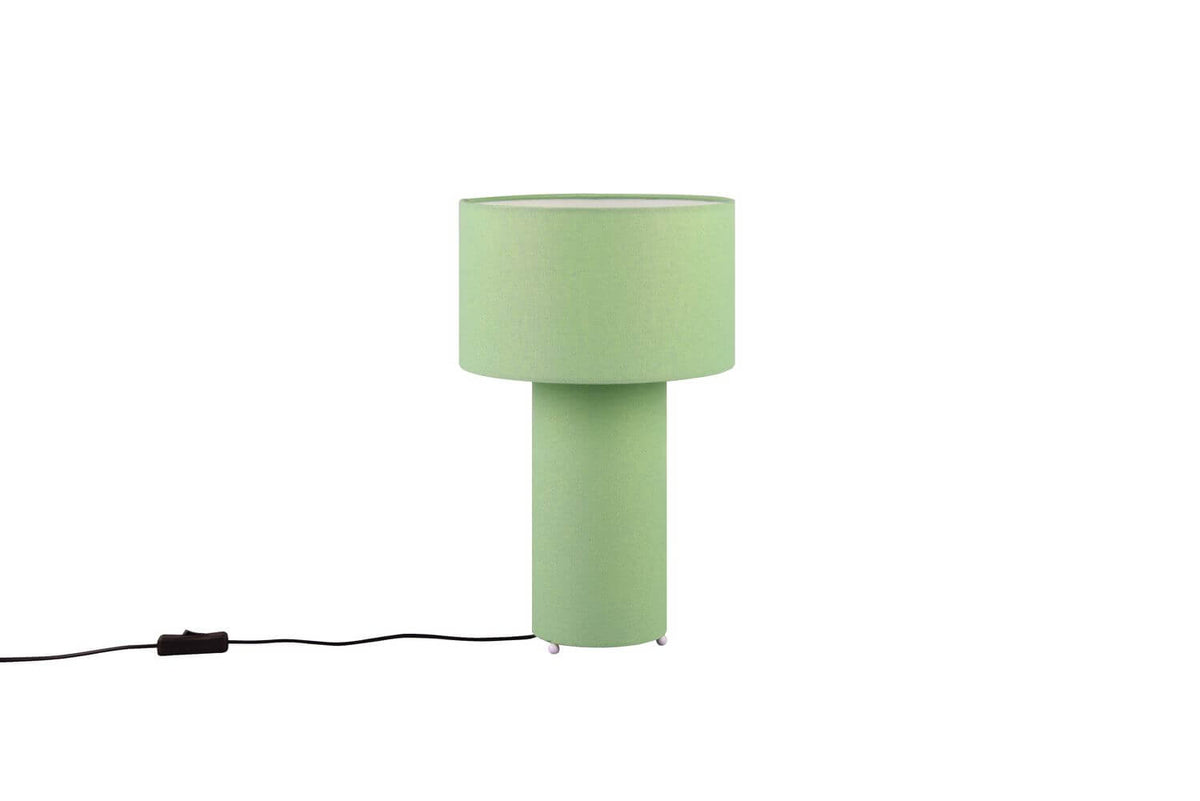 Lampe cylindrique verte éteinte, texture du tissu visible sur fond blanc