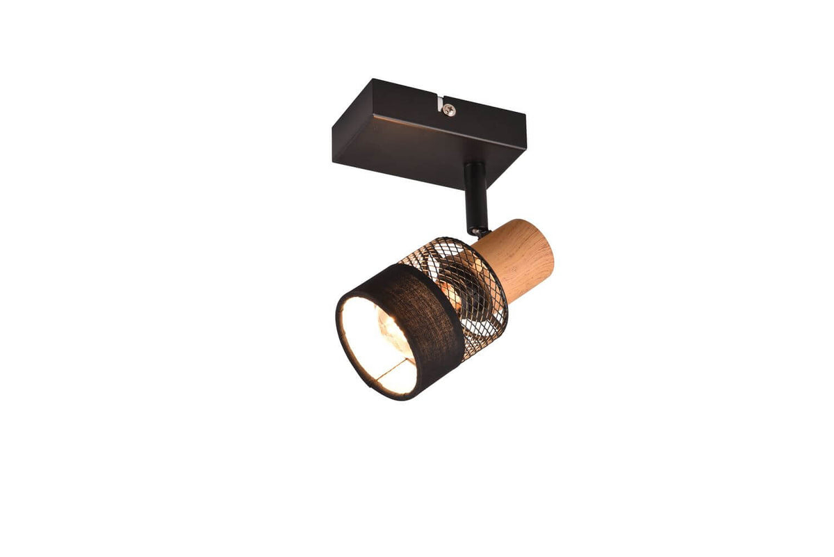Spot plafond noir mat orientable, fixé au plafond, avec diffuseur cylindrique et grille.