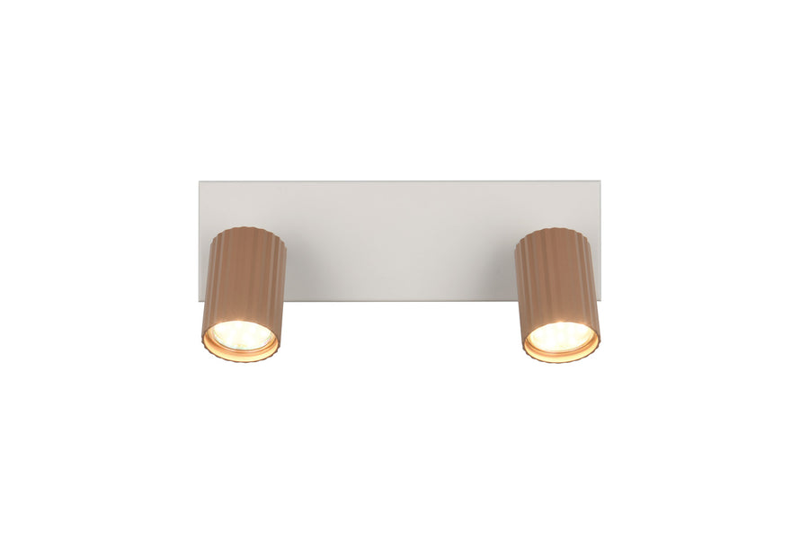 Spot double allumé, deux cylindres beiges orientés vers le bas, fixés sur une platine blanche.