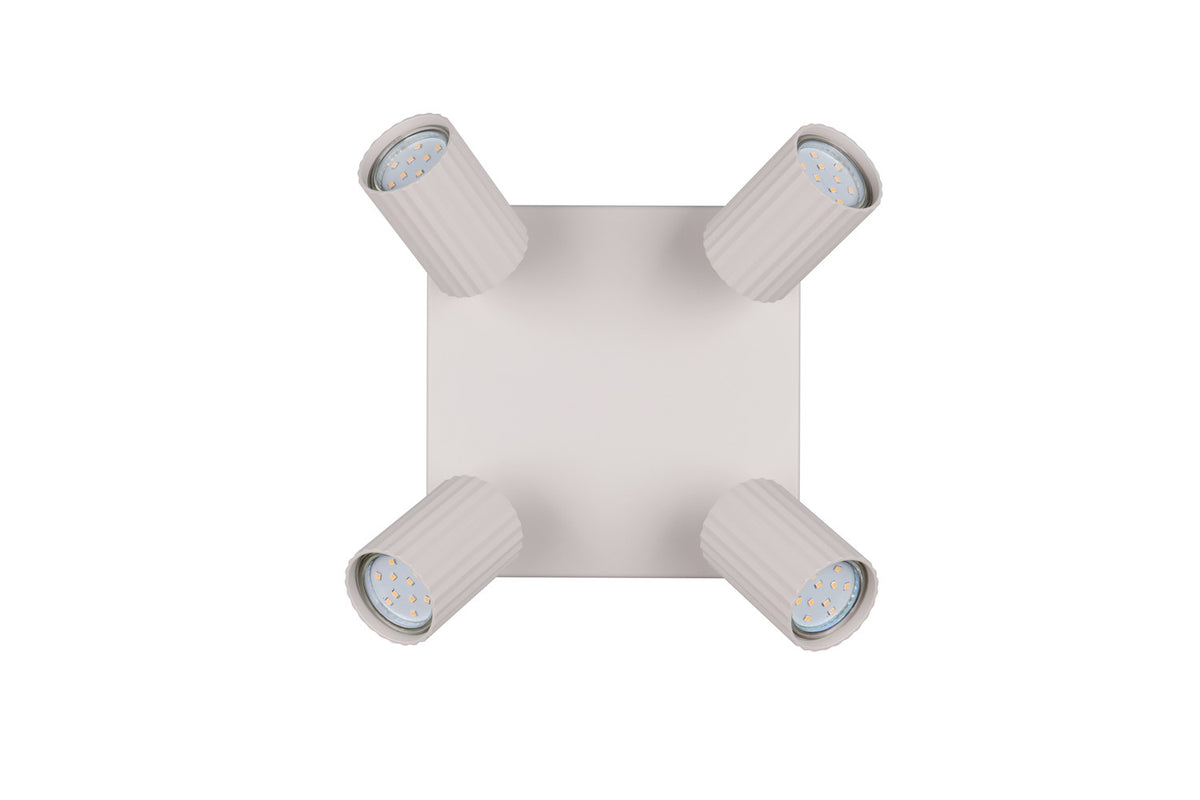 Vue de dessus du spot blanc à quatre projecteurs LED, têtes orientables en position écartée
