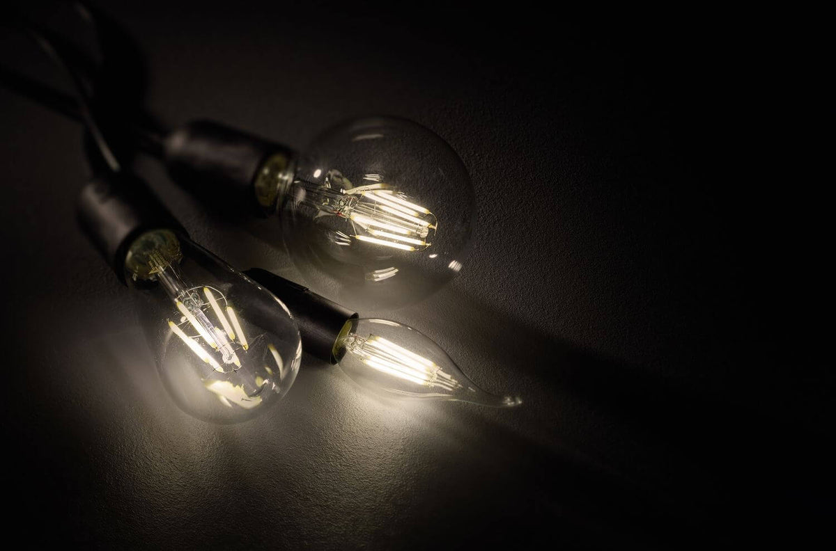 Ampoule LED E14 sphérique transparente, 4 W | Trio