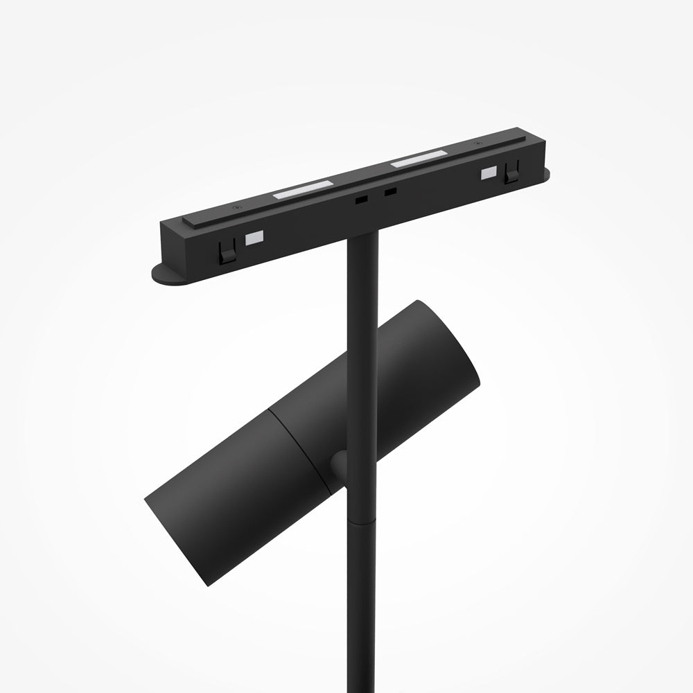 Détail de l'adaptateur noir clipsé sur le rail, tige et spot orientables